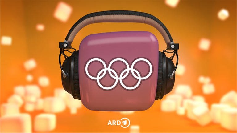 Olympische Ringe auf Würfel mit Kopfhörer